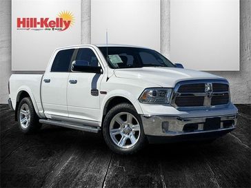 2016 RAM 1500 Laramie Longhorn in a Bright White Clear Coat exterior color and Cattle Tan/Blackinterior. Hill-Kelly Dodge (850) 786-2130 hillkellydodge.com 