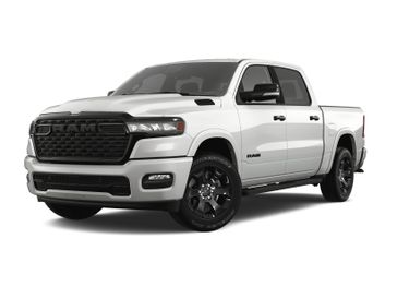 2025 RAM 1500 Big Horn Crew Cab 4x4 5'7' Box in a Bright White Clear Coat exterior color. Wilmington Auto Center Chrysler Dodge Jeep Ram (937) 556-6430 wilmingtonautocentercdjr.com 