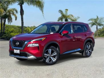 Used 2022 Nissan Rogue FWD Platinum in a Scarlet Ember Tint Coat exterior color and Charcoalinterior. Southbay Chrysler Jeep Dodge Ram (424) 404-5521 pixelmotiondemo.com 