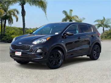 Used 2022 Kia Sportage LX AWD in a Black Cherry exterior color and Blackinterior. Southbay Chrysler Jeep Dodge Ram (424) 404-5521 pixelmotiondemo.com 