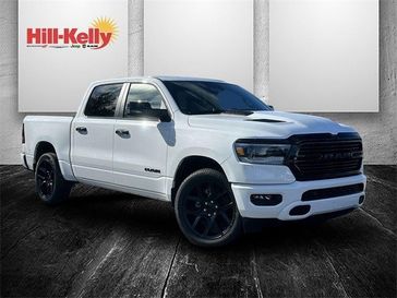 2024 RAM 1500 Laramie Crew Cab 4x4 5'7' Box in a Bright White Clear Coat exterior color and Blackinterior. Hill-Kelly Dodge (850) 786-2130 hillkellydodge.com 