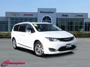 2018 Chrysler Pacifica Limited in a Bright White Clear Coat exterior color and Black/Alloy/Blackinterior. Champion Chrysler Jeep Dodge Ram 800-549-1084 pixelmotiondemo.com 