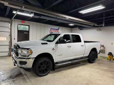 Used 2019 RAM 2500 Lone Star in a Bright White Clear Coat exterior color and Diesel Gray/Blackinterior. Jensen Chrysler Dodge Jeep Ram 507-354-0542 jensenchryslerdodgejeepram.com 
