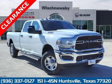 2024 RAM 2500 Tradesman Crew Cab 4x4 8' Box in a Bright White Clear Coat exterior color. Wischnewsky Dodge 936-755-5310 wischnewskydodge.com 