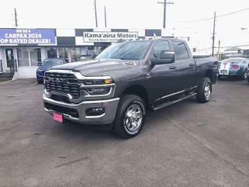 New 2026 RAM 2500 Tradesman Crew Cab 4x4 6'4' Box in a Granite Crystal Metallic Clear Coat exterior color. Kamaaina Motors 1-808-746-7956 kamaainamotors.com 