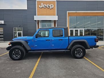 2021 Jeep Gladiator Mojave in a Hydro Blue Pearl Coat exterior color and Blackinterior. Victor Chrysler Dodge Jeep Ram 585-236-4391 victorcdjr.com 