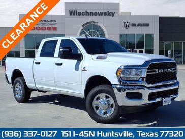 2024 RAM 2500 Tradesman Crew Cab 4x4 6'4' Box in a Bright White Clear Coat exterior color and Blackinterior. Wischnewsky Dodge 936-755-5310 wischnewskydodge.com 