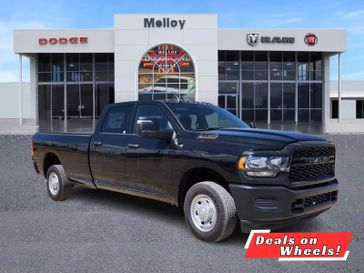 2024 RAM 2500 Tradesman Crew Cab 4x2 8' Box in a Diamond Black Crystal Pearl Coat exterior color and Blackinterior. Melloy Dodge RAM FIAT 505-588-4459 melloydodge.com 