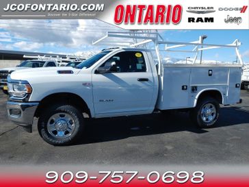 2022 RAM 2500 Tradesman in a Bright White Clear Coat exterior color and Blackinterior. Ontario Auto Center ontarioautocenter.com 