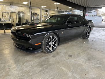 2018 Dodge Challenger  in a BLACK exterior color. Shields Motor Company Inc (620) 902-2035 shieldsmotorchryslerdodgejeep.com 