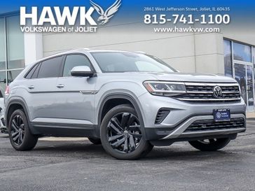 2023 Volkswagen Atlas Cross Sport 3.6L V6 SE w/Technology in a Pyrite Silver Metallic exterior color and Titan Blackinterior. Glenview Luxury Imports 847-904-1233 glenviewluxuryimports.com 