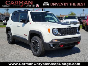 2023 Jeep Renegade Trailhawk 4x4 in a Alpine White Clear Coat exterior color and Blackinterior. Carman Chrysler Jeep Dodge Ram 302-317-2378 carmanchryslerjeepdodge.com 