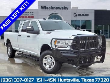 2024 RAM 2500 Tradesman Crew Cab 4x4 8' Box in a Bright White Clear Coat exterior color and Diesel Gray/Blackinterior. Wischnewsky Dodge 936-755-5310 wischnewskydodge.com 