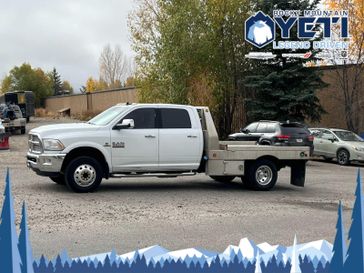 2016 RAM 3500 Chassis Laramie 4WD Crew Cab 172 WB 60 CA in a Bright White Clear Coat exterior color and Blackinterior. Rocky Mountain Yeti Jackson Hole 307-733-5337 rockymountainyetijacksonhole.com 