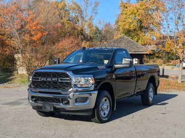 2024 RAM 3500 Tradesman Regular Cab 4x4 8' Box in a Diamond Black Crystal Pearl Coat exterior color and Diesel Gray/Blackinterior. Brattleboro CDJR 802-251-1111 brattleborocdjr.com 