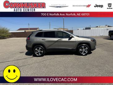 2020 Jeep Cherokee Limited in a Light Brownstone Pearl Coat exterior color and Blackinterior. Cornhusker Auto Center 402-866-8665 cornhuskerautocenter.com 