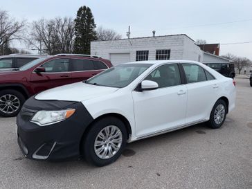 2012 Toyota Camry LE in a WHITE exterior color. Hometown Motors of Rockwell City 712-220-7644 hometownmotorsrc.com 