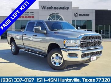 2024 RAM 2500 Tradesman Crew Cab 4x4 8' Box in a Billet Silver Metallic Clear Coat exterior color. Wischnewsky Dodge 936-755-5310 wischnewskydodge.com 