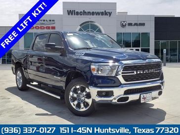 2023 RAM 1500 Lone Star Crew Cab 4x4 5'7' Box in a Patriot Blue Pearl Coat exterior color and Diesel Gray/Blackinterior. Wischnewsky Dodge 936-755-5310 wischnewskydodge.com 