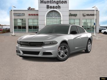 2023 Dodge Charger SXT in a Triple Nickel exterior color and Blackinterior. BEACH BLVD OF CARS beachblvdofcars.com 