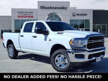 2024 RAM 2500 Tradesman Crew Cab 4x4 6'4' Box in a Bright White Clear Coat exterior color and Blackinterior. Wischnewsky Dodge 936-755-5310 wischnewskydodge.com 