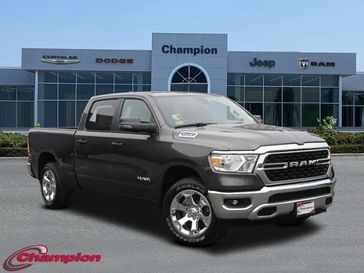 2024 RAM 1500 Big Horn Crew Cab 4x2 6'4' Box in a Granite Crystal Metallic Clear Coat exterior color and DELUXE CLOTHinterior. Champion Chrysler Jeep Dodge Ram 800-549-1084 pixelmotiondemo.com 