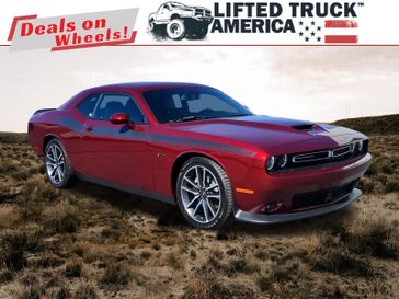 2023 Dodge Challenger R/T in a Octane Red Pearl Coat exterior color and Blackinterior. Lifted Truck America 888-267-0644 liftedtruckamerica.com 