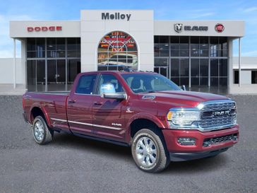 2024 RAM 3500 Limited in a Delmonico Red Pearl Coat exterior color and Blackinterior. Lifted Truck America 888-267-0644 liftedtruckamerica.com 