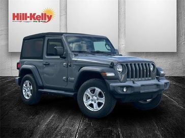 2018 Jeep Wrangler Sport S in a Sting-Gray Clear Coat exterior color and Blackinterior. Hill-Kelly Dodge (850) 786-2130 hillkellydodge.com 