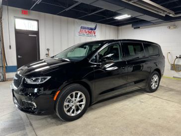 Used 2024 Chrysler Pacifica Touring L in a Diamond Black Crystal Pearl Coat exterior color and Black/Alloyinterior. Jensen Chrysler Dodge Jeep Ram 507-354-0542 jensenchryslerdodgejeepram.com 