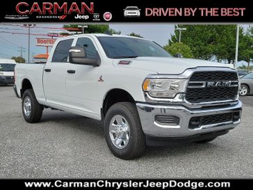 2024 RAM 2500 Tradesman Crew Cab 4x4 6'4' Box in a Bright White Clear Coat exterior color and Black - V9X9interior. Carman Chrysler Jeep Dodge Ram 302-317-2378 carmanchryslerjeepdodge.com 