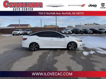 2022 Nissan Sentra SR in a Aspen White Tri Coat/Super Black exterior color and Sportinterior. Cornhusker Auto Center 402-866-8665 cornhuskerautocenter.com 