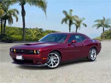 Used 2021 Dodge Challenger GT RWD in a Octane Red Pearl Coat exterior color and Blackinterior. Southbay Chrysler Jeep Dodge Ram (424) 404-5521 pixelmotiondemo.com 