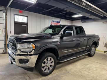 Used 2022 RAM 3500 Limited in a Granite Crystal Metallic Clear Coat exterior color and Indigo/Frostinterior. Jensen Chrysler Dodge Jeep Ram 507-354-0542 jensenchryslerdodgejeepram.com 