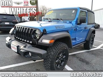 2022 Jeep Wrangler Willys in a Hydro Blue Pearl Coat exterior color and Blackinterior. Don White's Timonium Chrysler Dodge Jeep Ram 410-881-5409 donwhites.com 