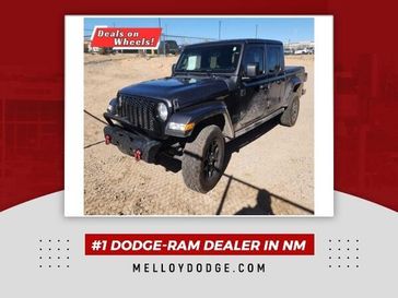 2021 Jeep Gladiator Sport in a Granite Crystal Metallic Clear Coat exterior color and Blackinterior. Melloy Dodge RAM FIAT 505-588-4459 melloydodge.com 