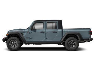 New 2026 Jeep Gladiator Rubicon in a Anvil Clear Coat exterior color and Blackinterior. Perkins La Junta 719-383-2250 perkinslajunta.com 