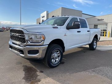 2024 RAM 2500 Tradesman Crew Cab 4x4 6'4' Box in a Bright White Clear Coat exterior color and Blackinterior. Legacy Auto Center 620-315-9264 legacyautocenter.net 