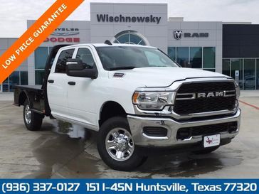 2024 RAM 2500 Tradesman Crew Cab 4x4 8' Box in a Bright White Clear Coat exterior color and Diesel Gray/Blackinterior. Wischnewsky Dodge 936-755-5310 wischnewskydodge.com 