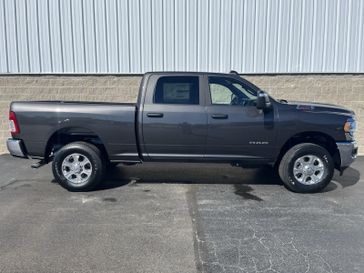 2024 RAM 2500 Big Horn Crew Cab 4x4 6'4' Box in a Granite Crystal Metallic Clear Coat exterior color and Diesel Gray/Blackinterior. Wilmington Auto Center Chrysler Dodge Jeep Ram (937) 556-6430 wilmingtonautocentercdjr.com 