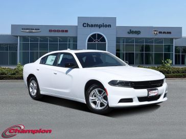 2023 Dodge Charger SXT Rwd in a White Knuckle exterior color and HOUNDSTOOTHinterior. Champion Chrysler Jeep Dodge Ram 800-549-1084 pixelmotiondemo.com 