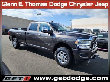 2024 RAM 3500 Laramie Crew Cab 4x4 8' Box in a Granite Crystal Metallic Clear Coat exterior color and Blackinterior. Glenn E Thomas 100 Years Of Excellence (866) 340-5075 getdodge.com 