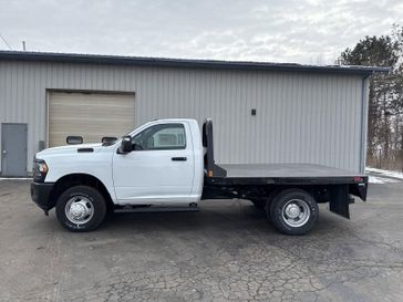 2024 RAM 3500 Tradesman Chassis Regular Cab 4x4 60' Ca in a Bright White Clear Coat exterior color. Victor Chrysler Dodge Jeep Ram 585-236-4391 victorcdjr.com 