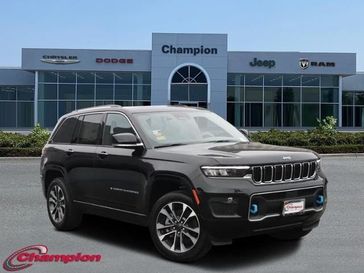 2023 Jeep Grand Cherokee Overland 4xe in a Diamond Black Crystal Pearl Coat exterior color and NAPPA LEATHERinterior. Champion Chrysler Jeep Dodge Ram 800-549-1084 pixelmotiondemo.com 