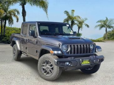 New 2026 Jeep Gladiator Sport S in a Gray exterior color and Blackinterior. Southbay Chrysler Jeep Dodge Ram (424) 404-5521 pixelmotiondemo.com 
