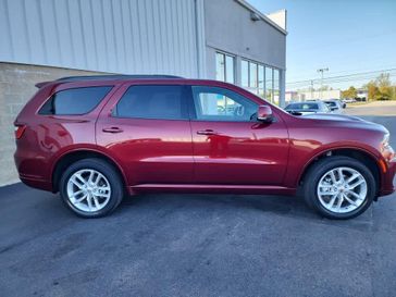 2021 Dodge Durango GT Plus in a Octane Red Pearl Coat exterior color and Blackinterior. Wilmington Auto Center Chrysler Dodge Jeep Ram (937) 556-6430 wilmingtonautocentercdjr.com 