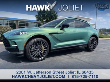 2023 Aston Martin DBX 707 in a Iridescent Emerald exterior color and Havanainterior. Glenview Luxury Imports 847-904-1233 glenviewluxuryimports.com 