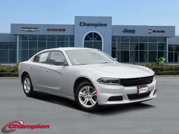 2023 Dodge Charger SXT Rwd in a Triple Nickel exterior color and HOUNDSTOOTHinterior. Champion Chrysler Jeep Dodge Ram 800-549-1084 pixelmotiondemo.com 