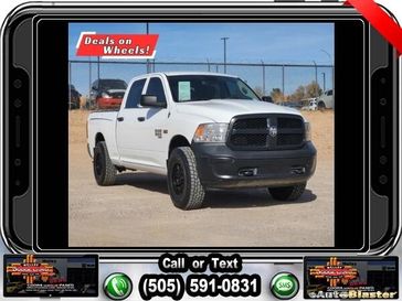 2021 RAM 1500 Classic Tradesman in a Bright White Clear Coat exterior color and Diesel Gray/Blackinterior. Melloy Dodge RAM FIAT 505-588-4459 melloydodge.com 