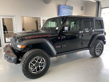 2024 Jeep Wrangler 4-door Rubicon in a Black Clear Coat exterior color and Blackinterior. Legacy Auto Center 620-315-9264 legacyautocenter.net 